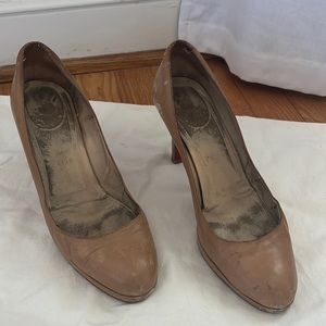 Lou out in tan pumps